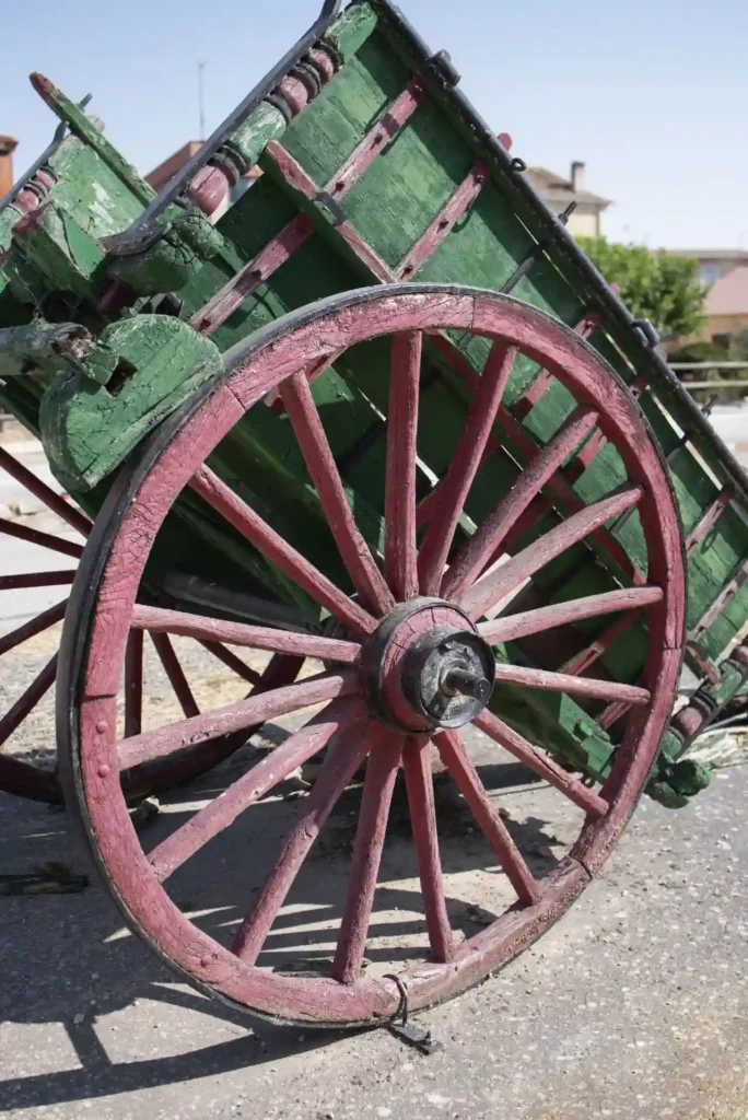 Frenatura meccanica. Blocco ruota ceppo in legno.